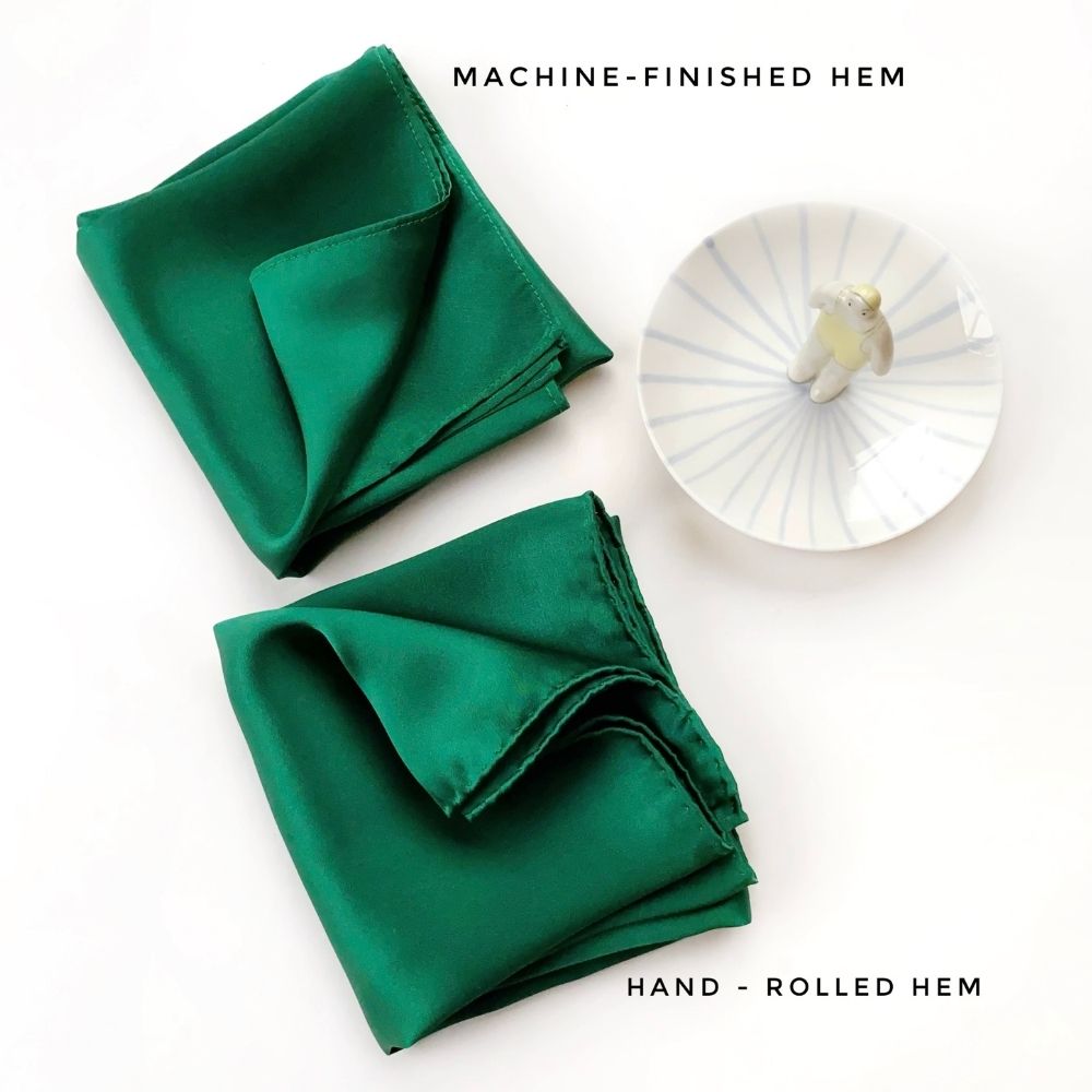 Machine-finished and hand-rolled hem comparison in Jade Green silk