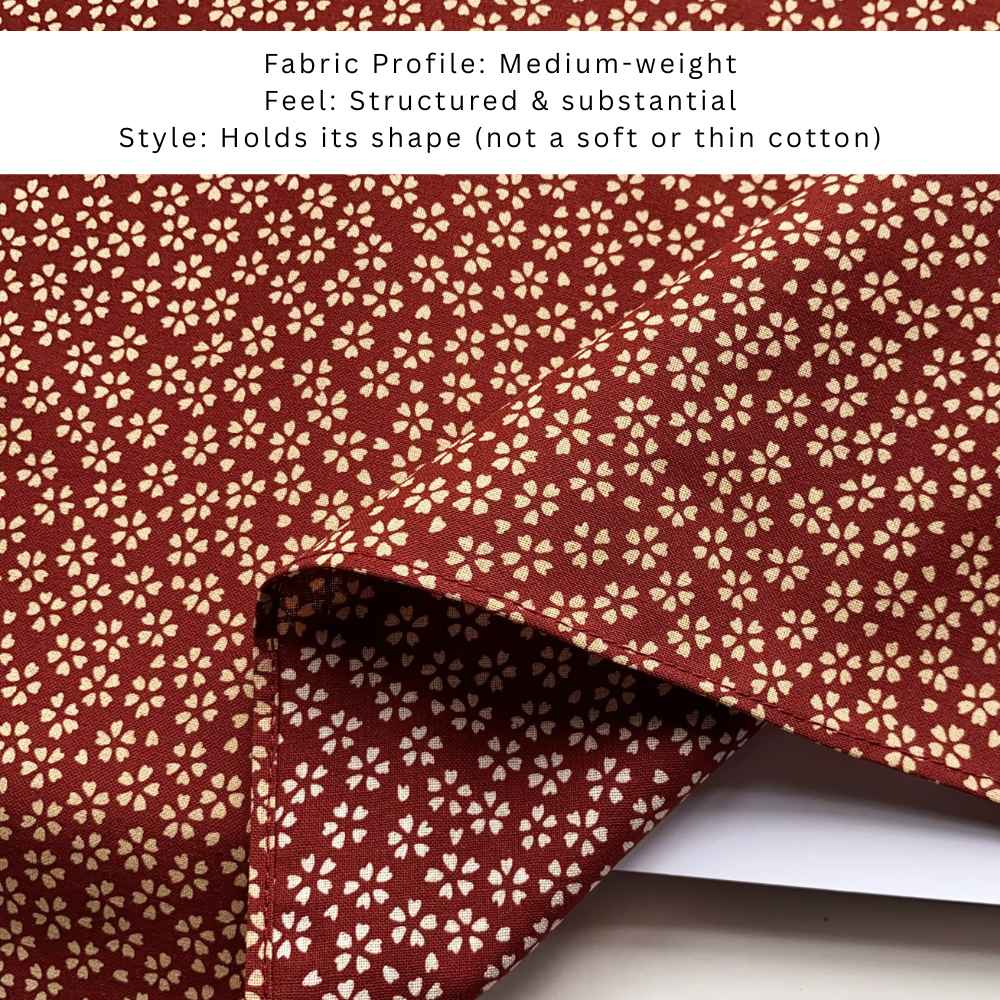 close up of Red bandana with a subtle floral pattern on a white background