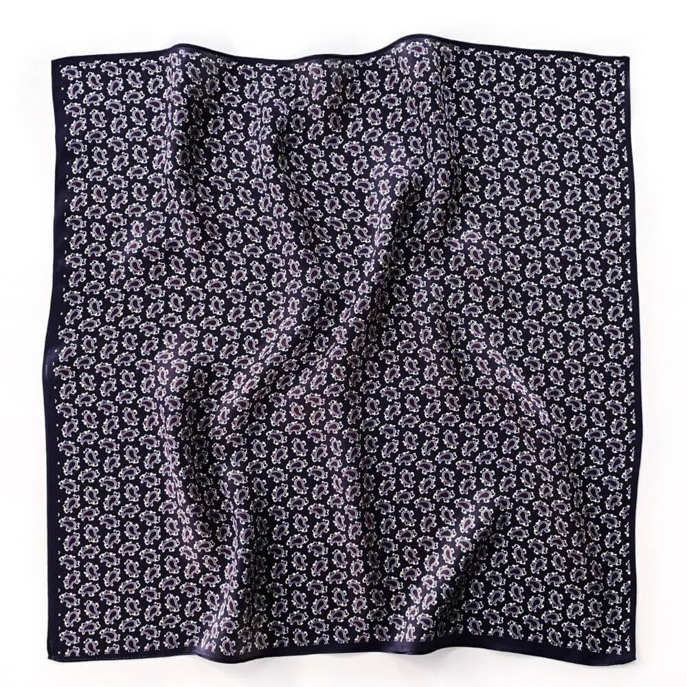 Dark purple paisley silk scarf laid flat showing full 53cm square design