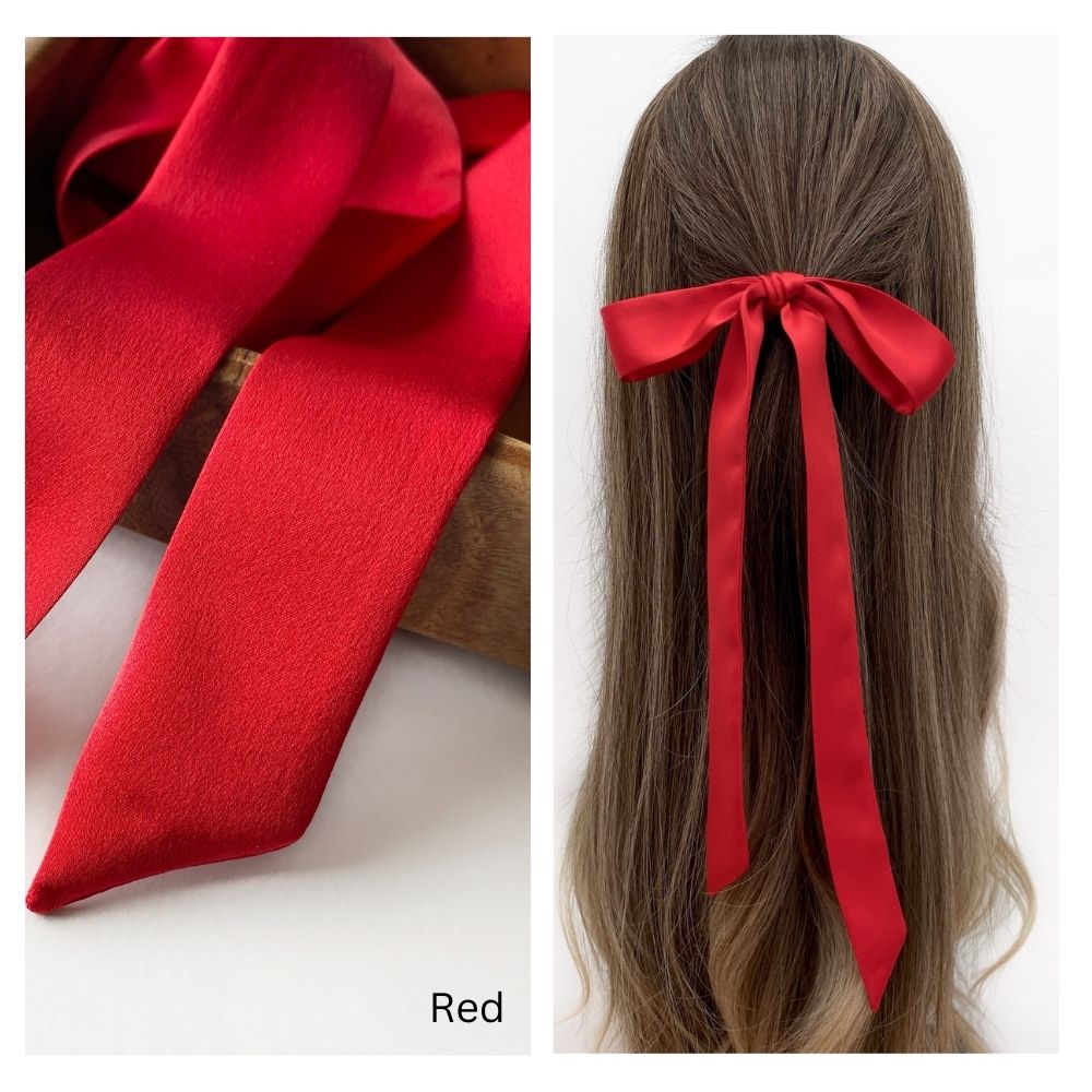 River Minami red mulberry silk satin skinny scarf, styled as a hair bow.