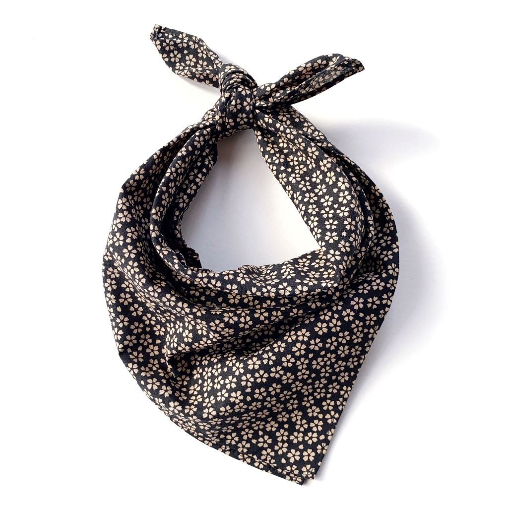A black Japanese sakura print cotton bandana neck scarf against white background