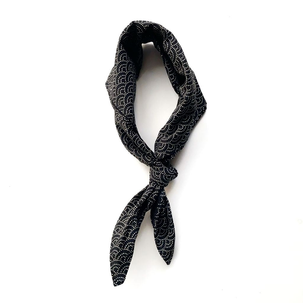 A folded black japanese wave print cotton  neckerchief 