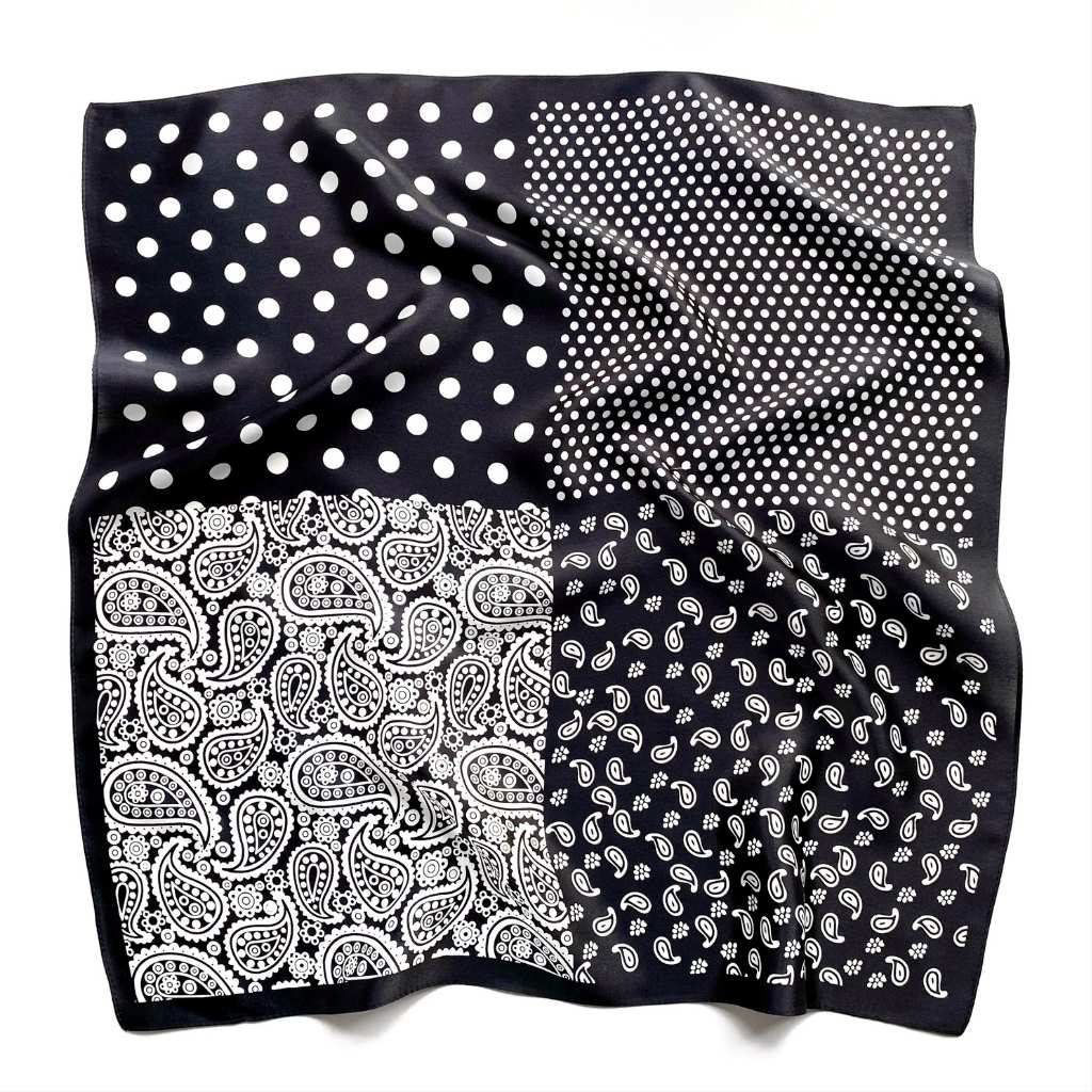 Black and white polka dot and paisley pattern mulberry silk square scarf laid flat on a white background.