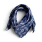 Blue paisley print mulberry silk square scarf placed on a white background