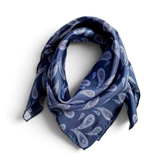 Blue paisley print mulberry silk square scarf placed on a white background