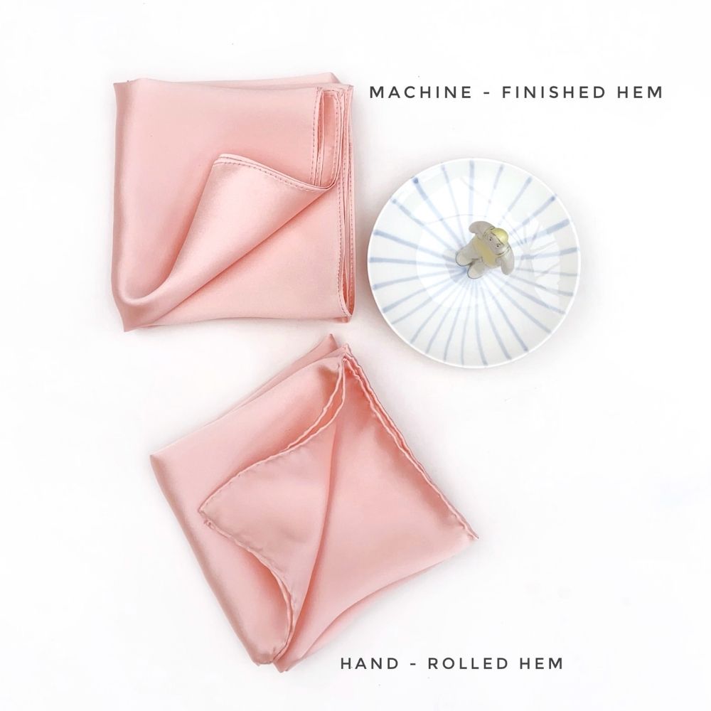 Hand-rolled hem vs machine-stitched hem comparison in blush silk