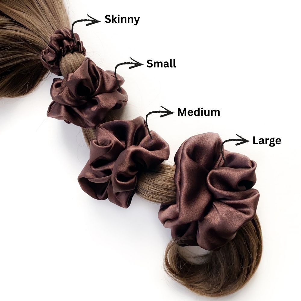 Set of mulberry silk satin scrunchies and silk hair ties labeled 'Skinny', 'Small', 'Medium', and 'Large' on a white background.