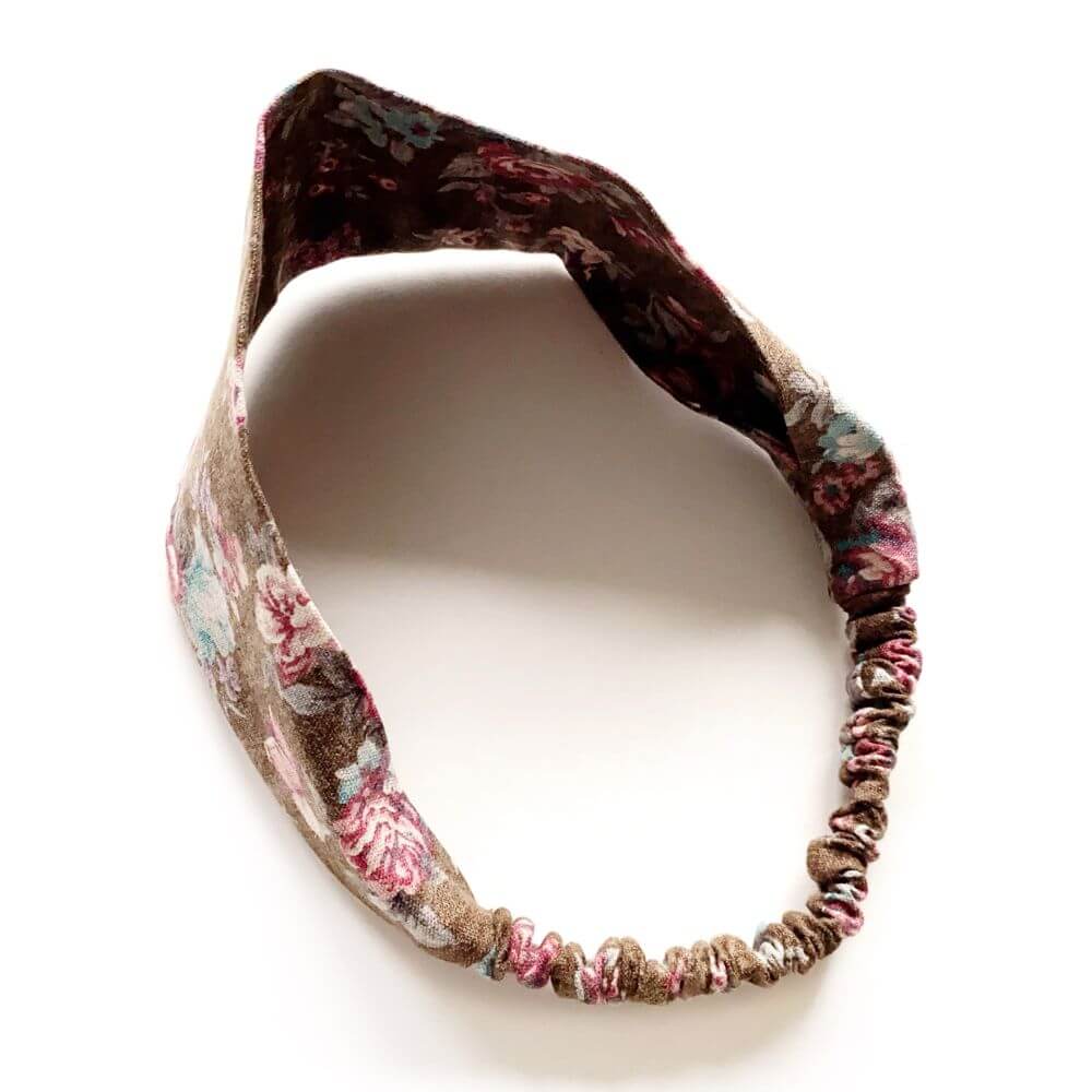 Brown rose floral patterned linen headband on a white background