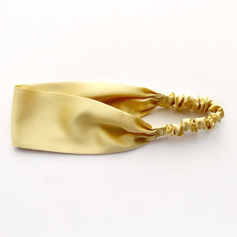 Handmade champagne gold mulberry silk headband by River Minami.