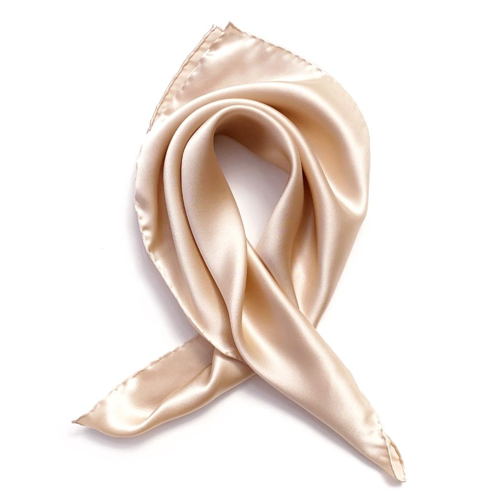 Champagne beige mulberry silk satin square scarf folded on white background