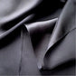 close up of a black mulberry silk square scarf 