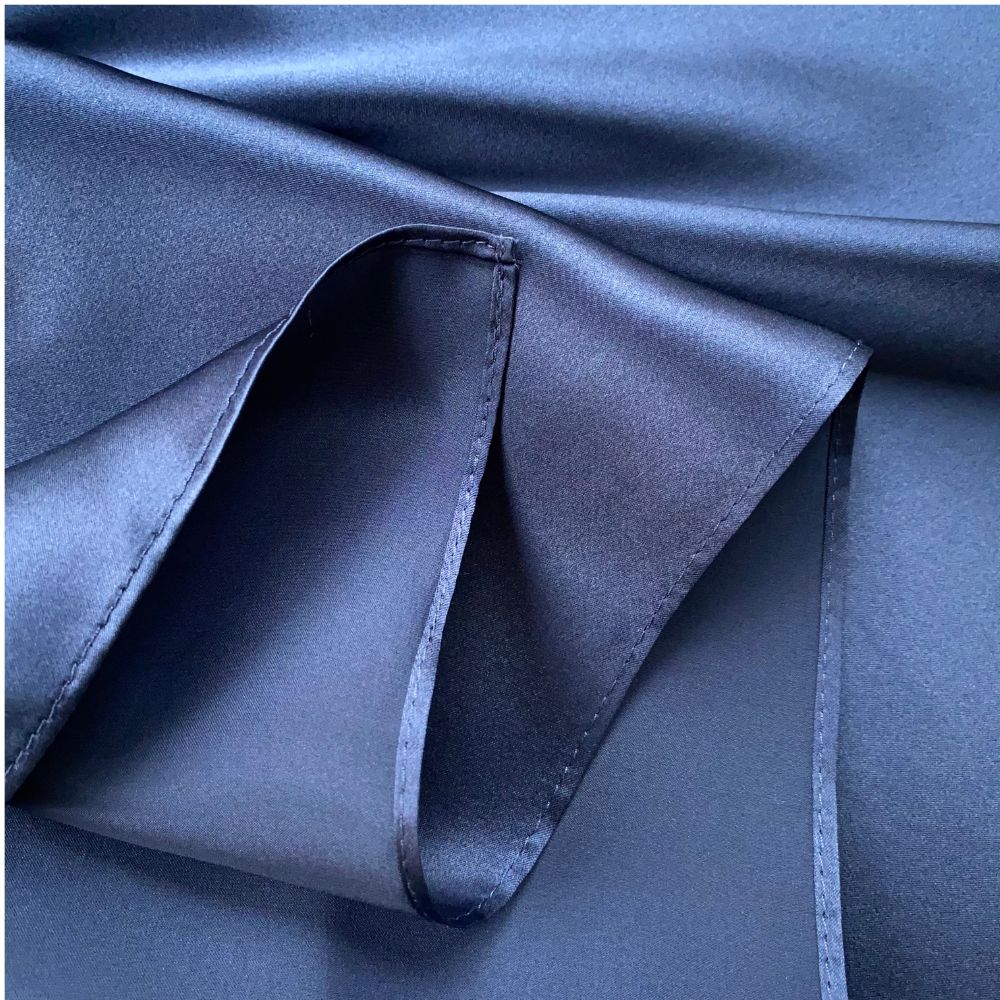 closed up of a navy blue mulberry silk square scarf
