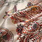 close up of an ivory beige mulberry silk square scarf with burnt orange leafy pattern