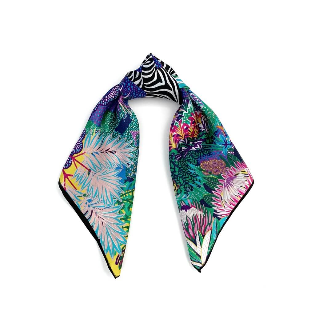 Colourful tropical print mulberry silk hair scarf on a white background