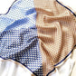 100% mulberry silk square scarf with geometric patterns on a white background
