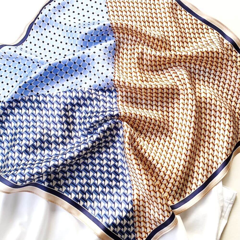 100% mulberry silk square scarf with geometric patterns on a white background