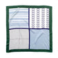 flat blue white geometric pattern mulberry silk square scarf with green border on a white background