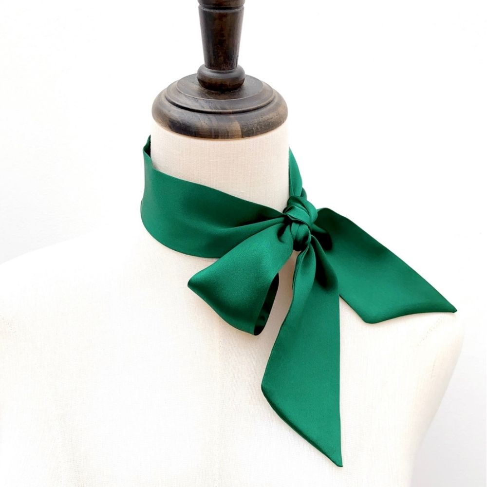 forest green mulberry silk satin skinny scarf tied around mannequin's neck
