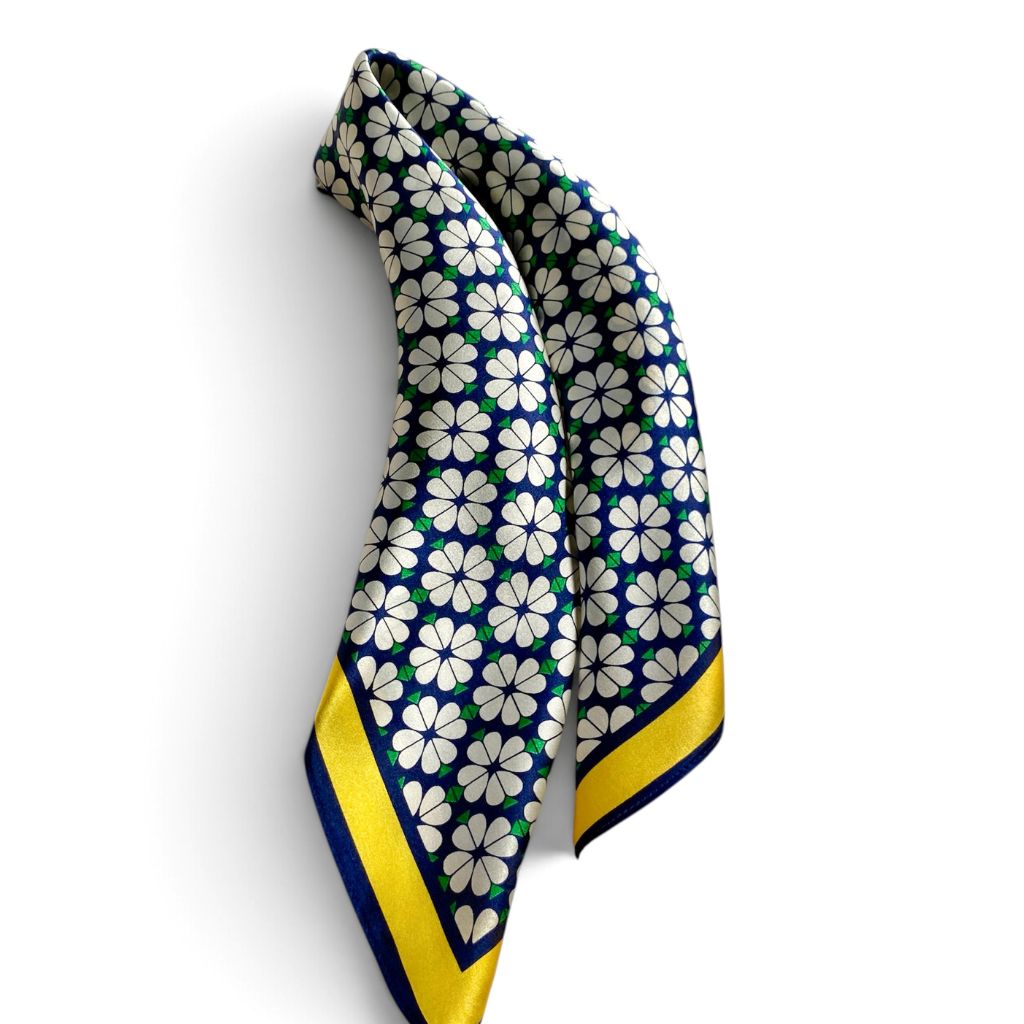 four leaf clover print mulberry silk square scarf in white navy and green with yellow border n the white background
