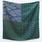 Green mulberry silk square scarf  with paisley and geometric patterns on a white background