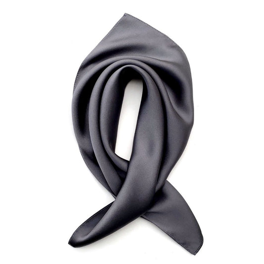 Slate grey silk satin square scarf arranged in a soft folded shape on a white background.