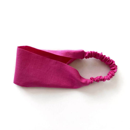 hot pink linen headband on a white background
