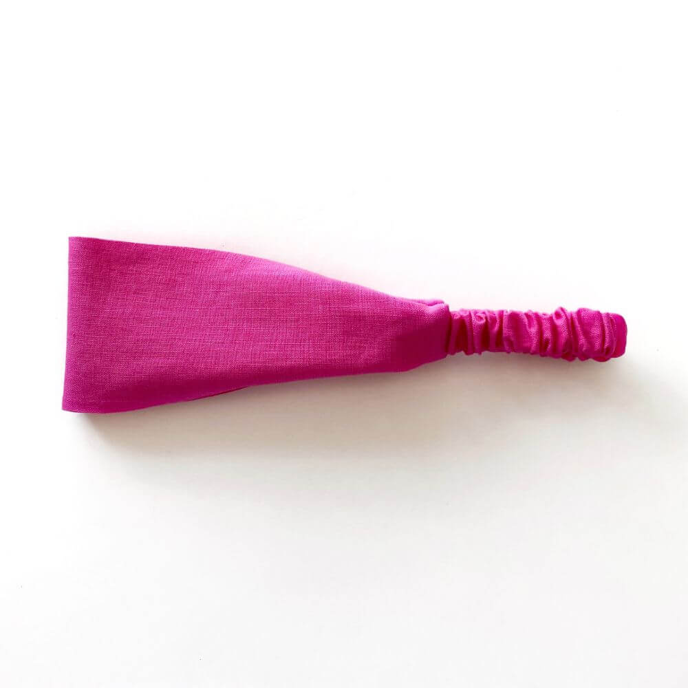 hot pink linen headband on a white background