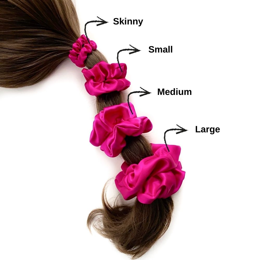 set of hot pink pure mulberry silk satin scrunchies and hair ties tied on the pony tail with size chat on a white background