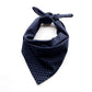 Navy blue bandana with small white floral patterns on a white background