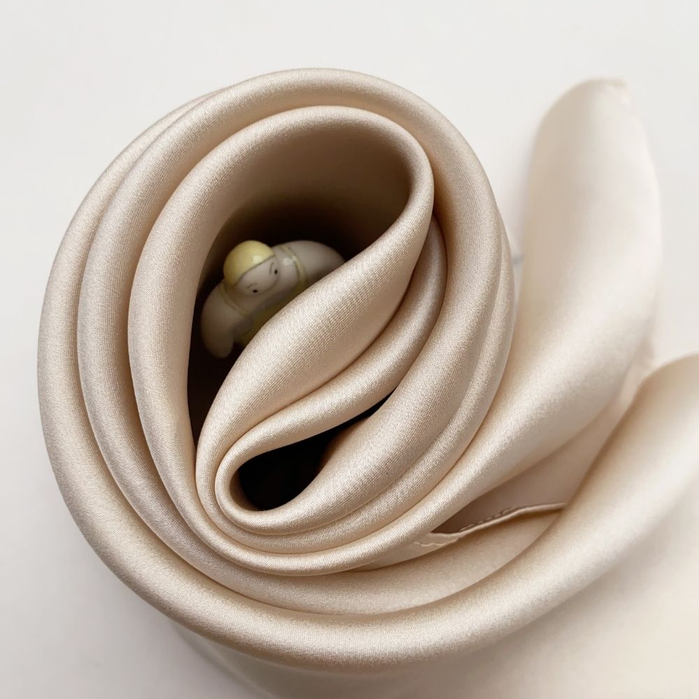 Pearl Cream 52cm Mulberry Silk Satin Square Scarf styled in a swirl around a mini toy person's head