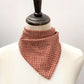 Red Kanoko Japanese cotton bandana tied as a neckerchief on a mannequin