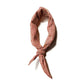 Red Kanoko cotton bandana twisted and tied, styled as a skinny scarf
