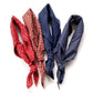 Two red and two blue Japanese wave and cherry blossom patterned cotton bandana square scarf on a white background