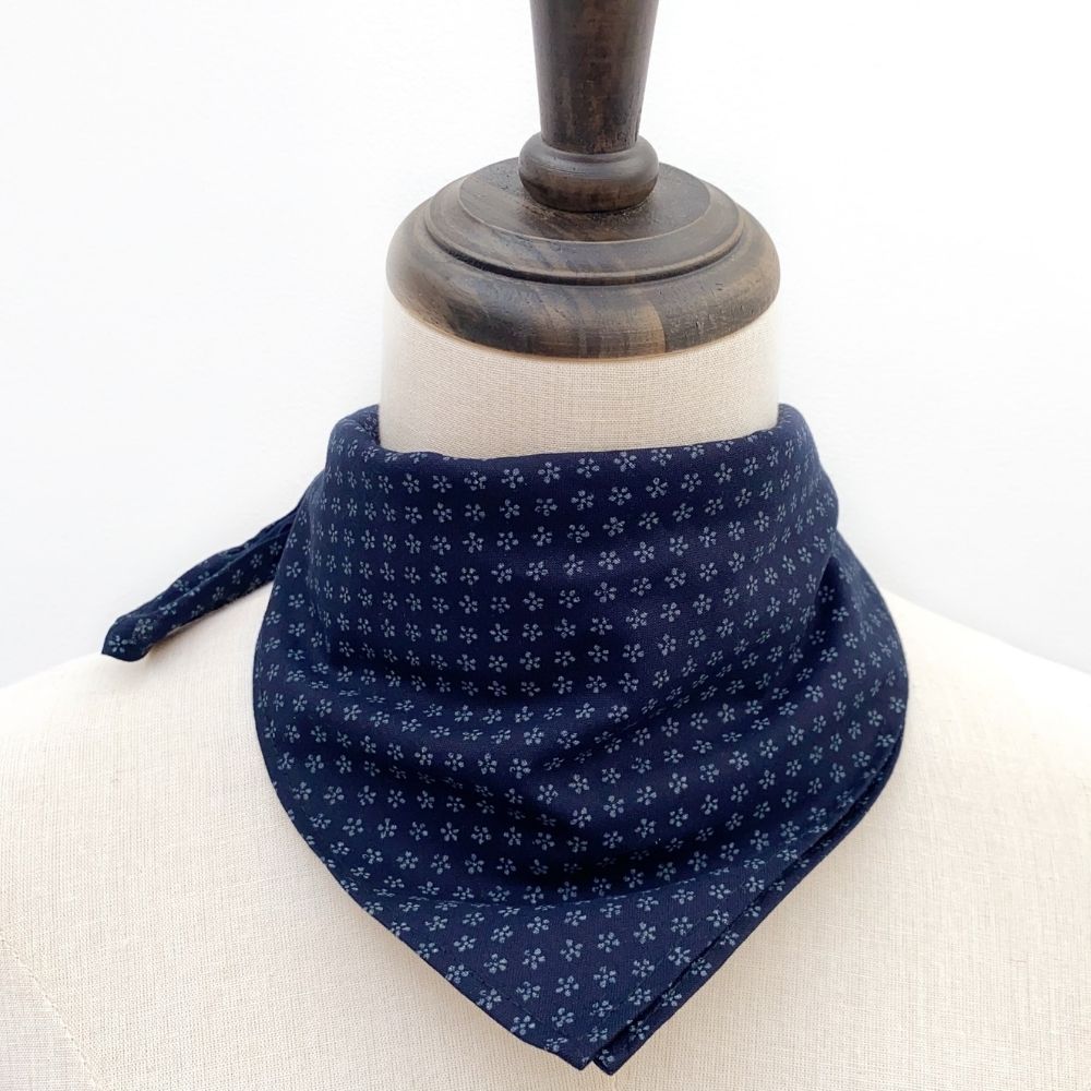 Navy blue cherry blossom patterned Japanese cotton bandana square scarf  on a mannequin with a white background