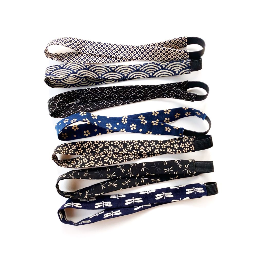 Set of six Japanese patterned skinny cotton headbands on a white background