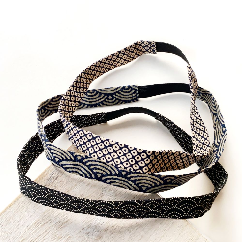 Set of Japanese patterned cotton skinny headbands on a white surface