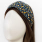 Liberty Cherry Drop print headband displayed on a mannequin, showing the 8 cm wide flat band and secure fit.