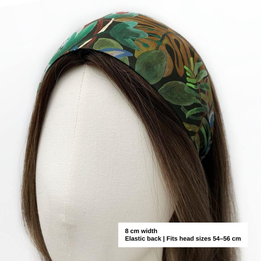 Liberty Jungle Trip cotton headband displayed on a mannequin, showing the 8 cm wide flat band and comfortable fit for head sizes 54–56 cm.