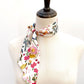 A floral liberty silk skinny neck scarf