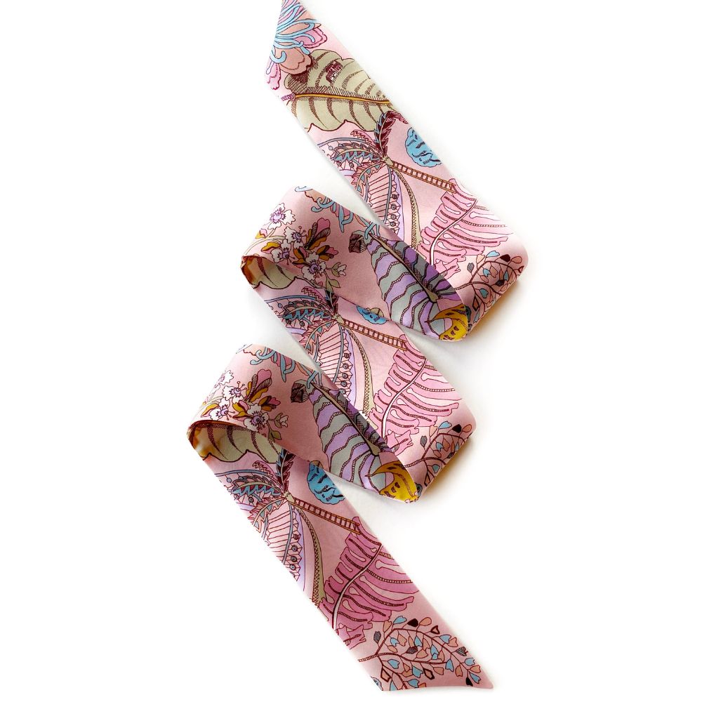 pink liberty silk skinny scarf on a white background