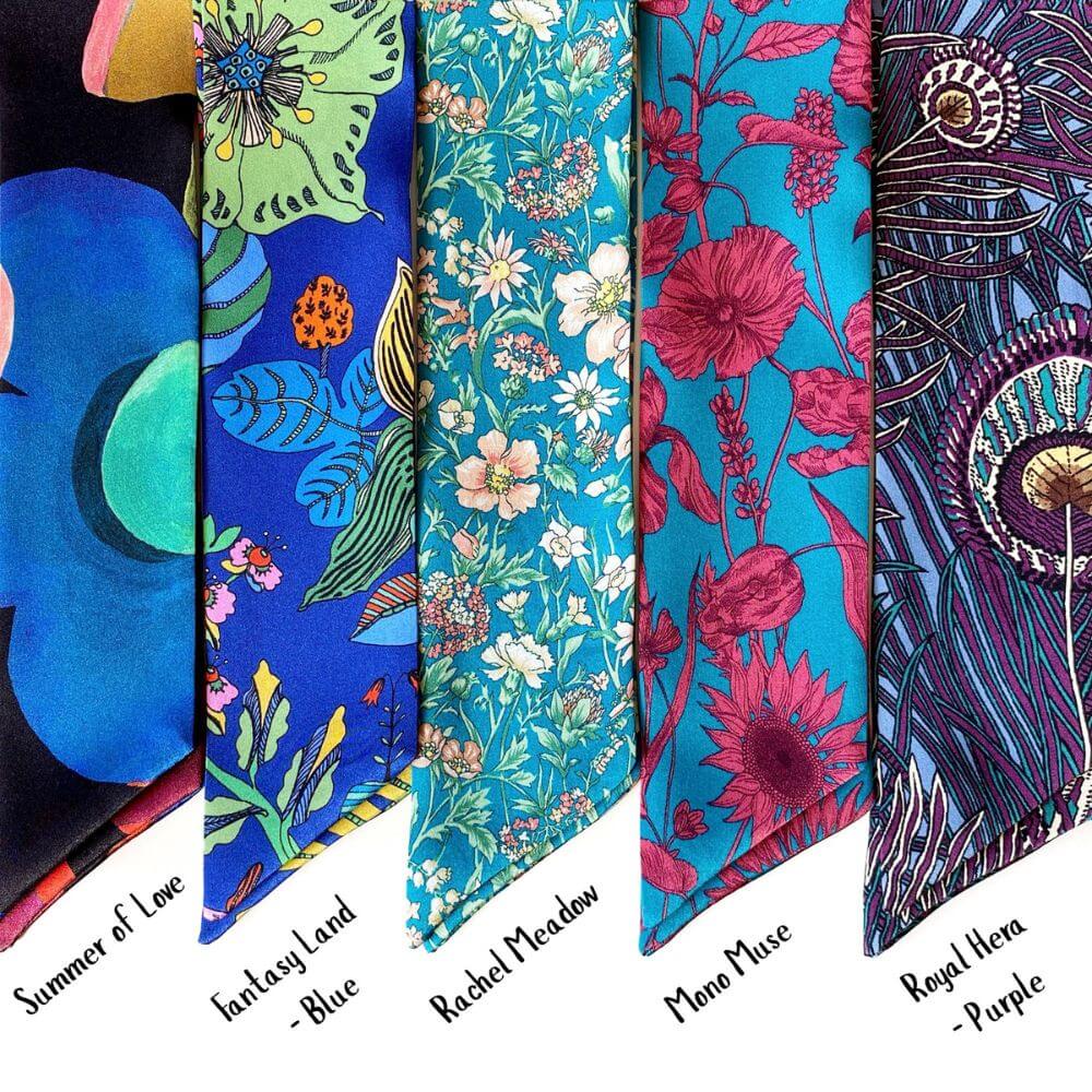 Collection of colorful Liberty silk skinny scarves with various patterns and names.