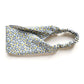 A Liberty London Tana Lawn cotton headband with a small yellow and blue floral pattern on a white background, featuring a gathered elastic band, photographed on a clean white surface.