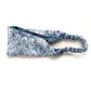 Liberty London Tana Lawn cotton headband with william morris print" lodden" a blue and white floral pattern, featuring an elastic back, laid flat on a white background.
