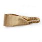 A sand linen headband with an elastic back, displayed on a clean white background.