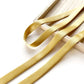 Gold mulberry silk skinny ribbon scarf on a wooden surface with a white background