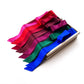 Set of mulberry silk satin skinny scarf ribbons in various colors on a white background 