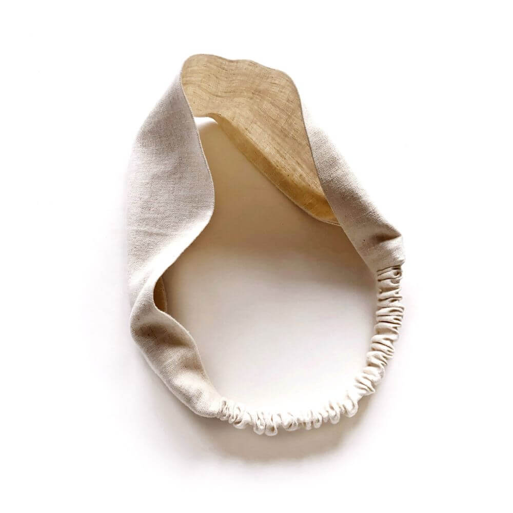 natural linen headband on a white background