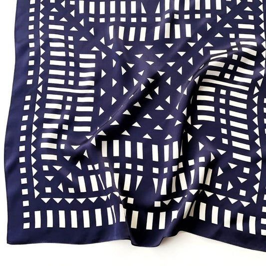 Navy blue silk scarf with white geometric pattern