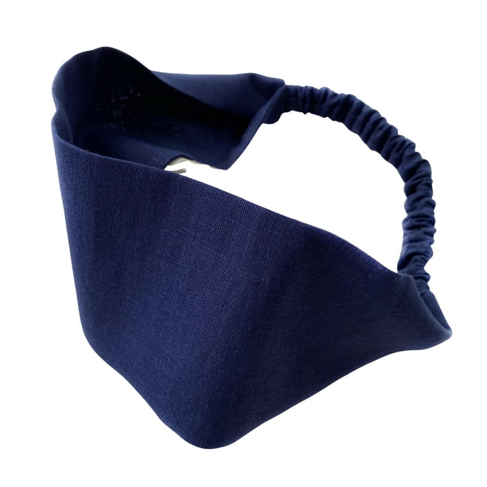 Navy blue linen headband on a white background