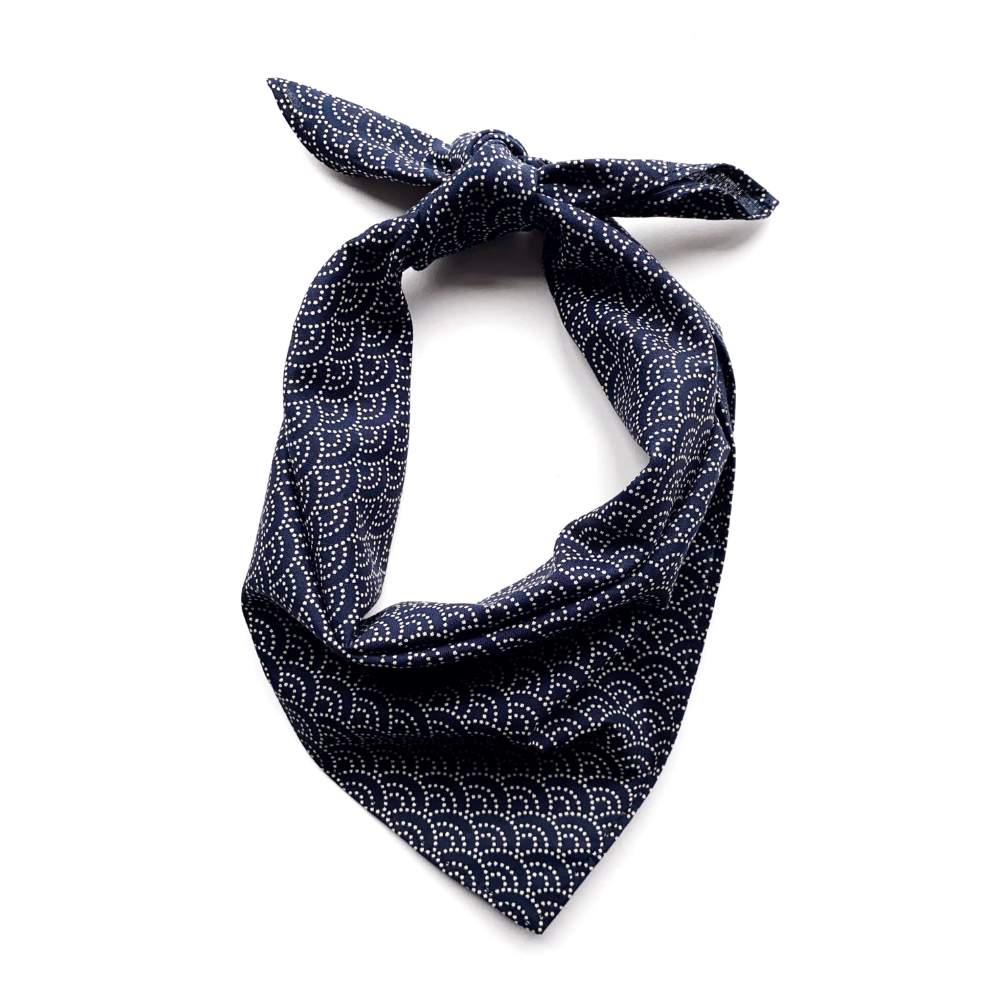 Navy blue bandana with white japanese wave pattern on a white background
